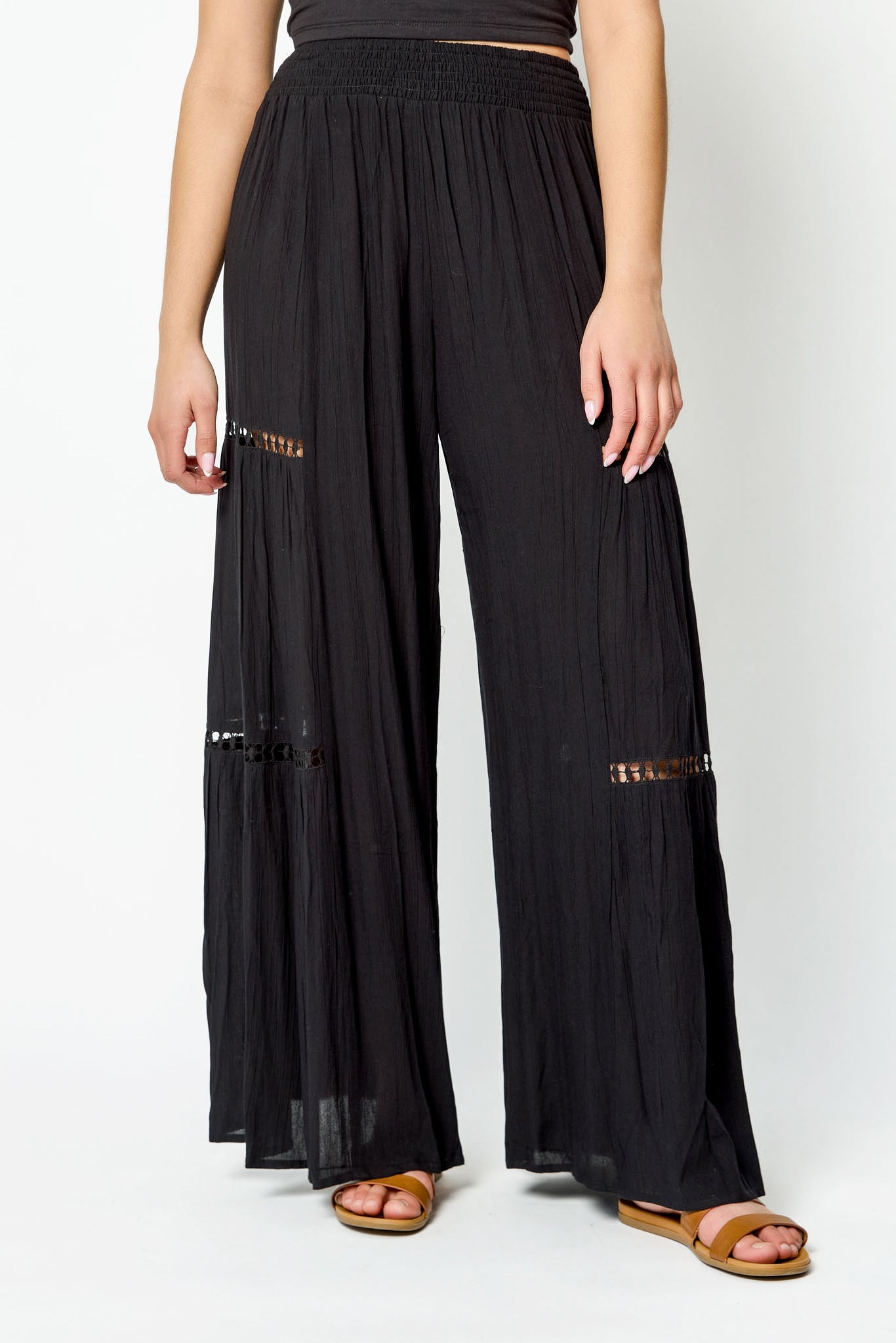 Pantalon avec jambe large en gaze froissée avec bordure au crochet