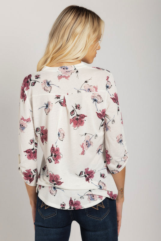 Blouse florale à manches retroussées et demi-patte