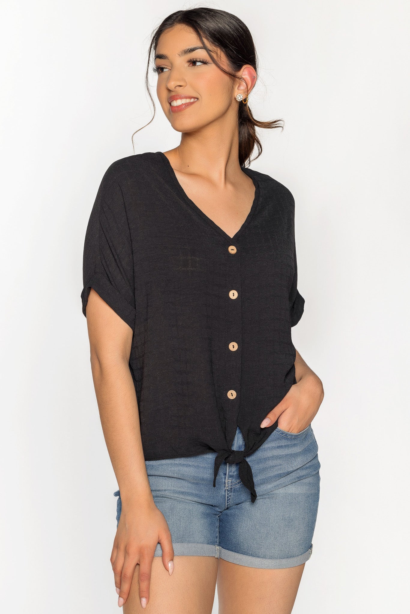 Blouse à carreaux devant noué