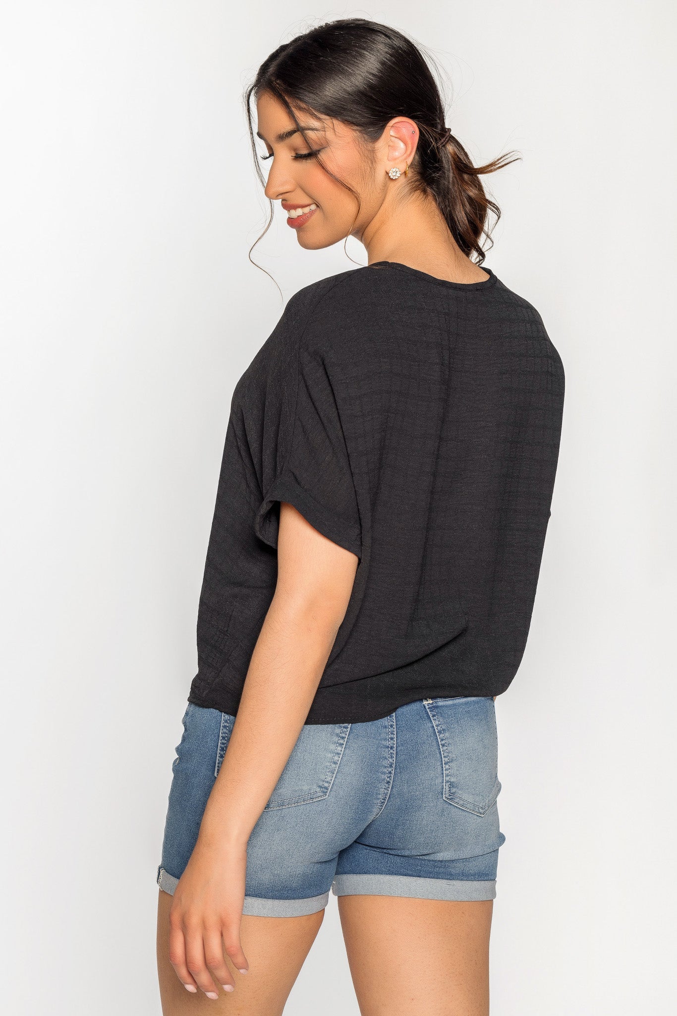 Blouse à carreaux devant noué