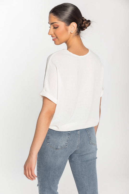 Blouse à carreaux devant noué