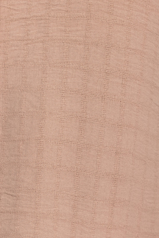 Blouse à carreaux devant noué