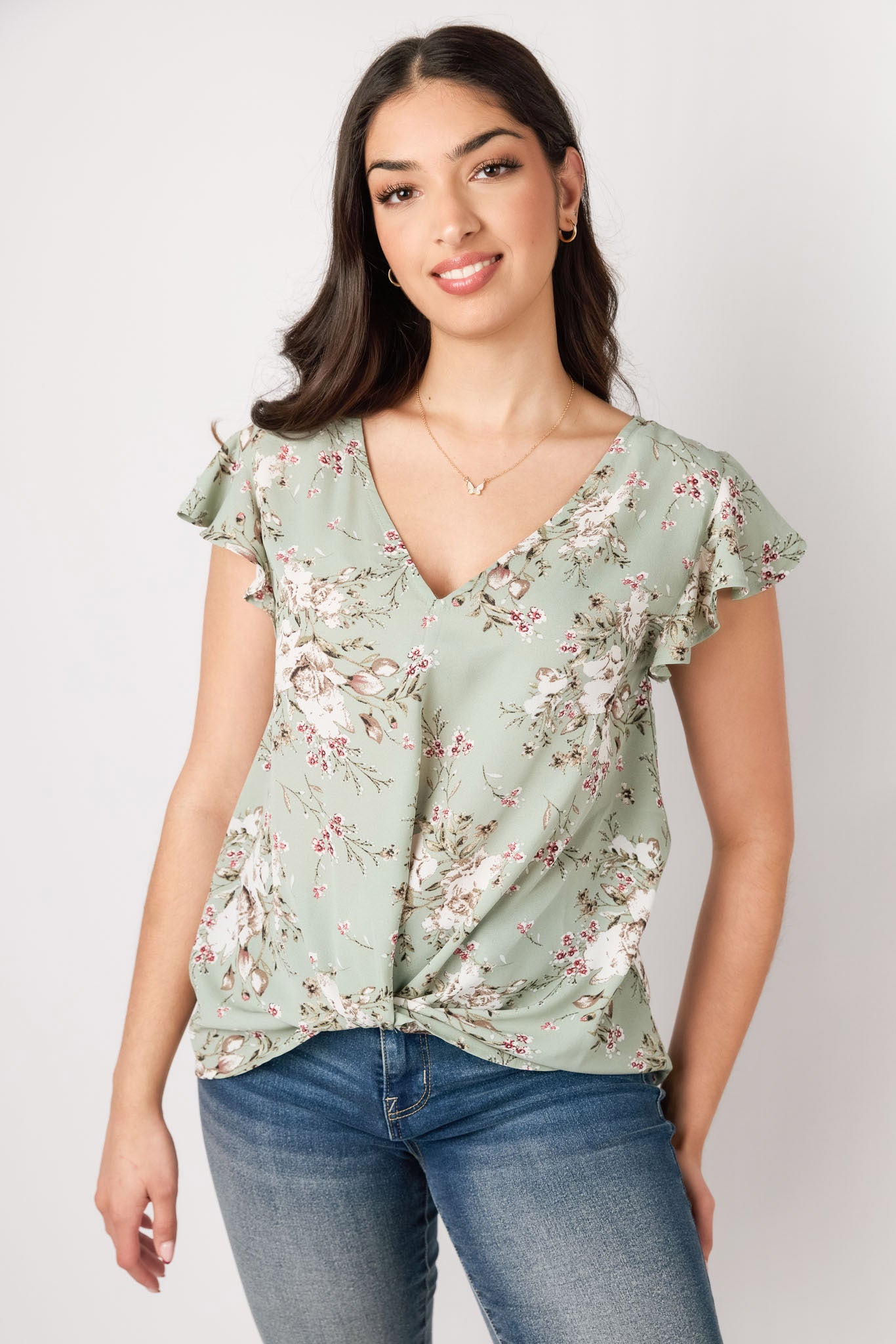 Chemise avec manches à volants et col en V avec ourlet torsadé