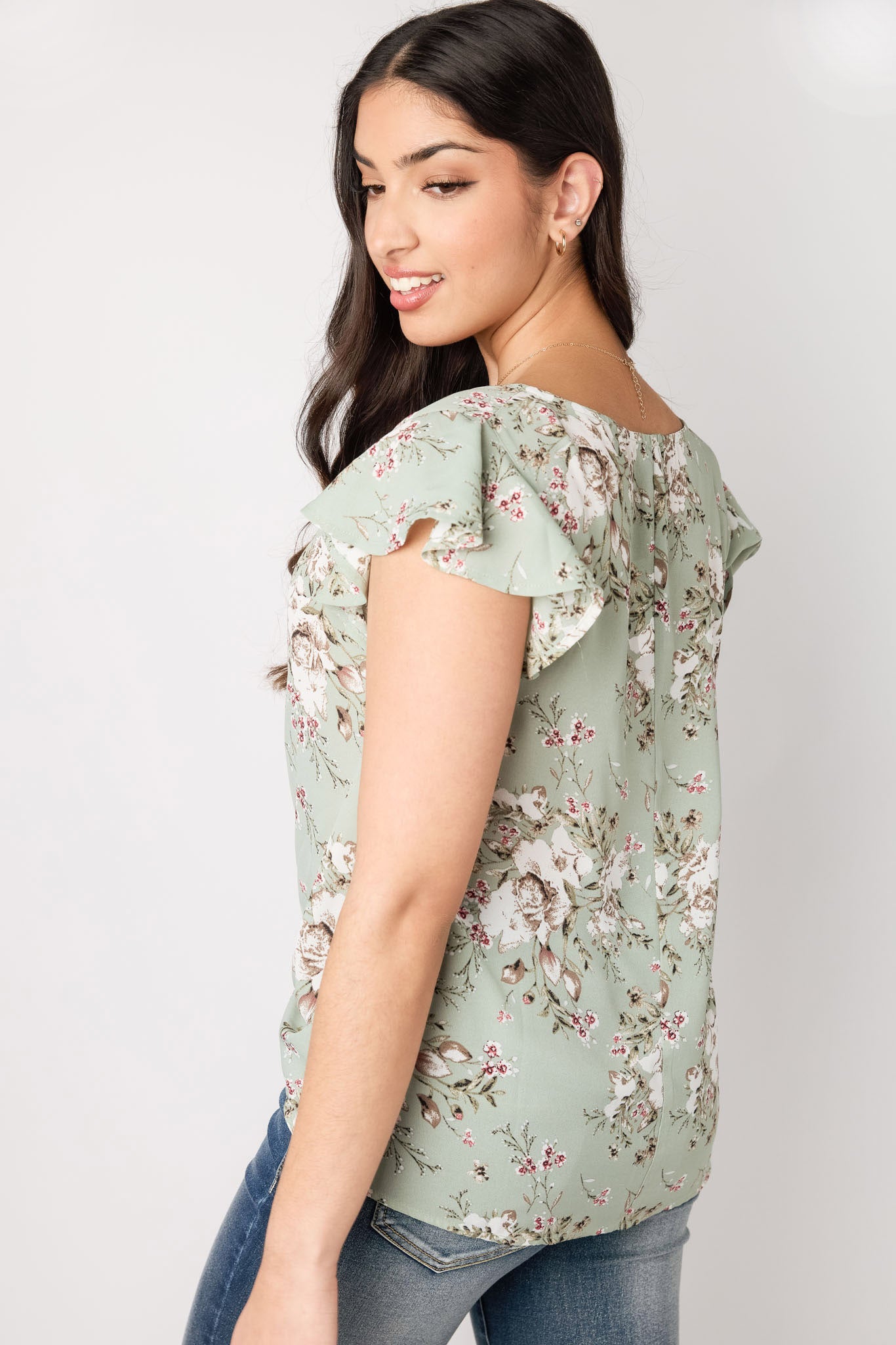 Chemise avec manches à volants et col en V avec ourlet torsadé