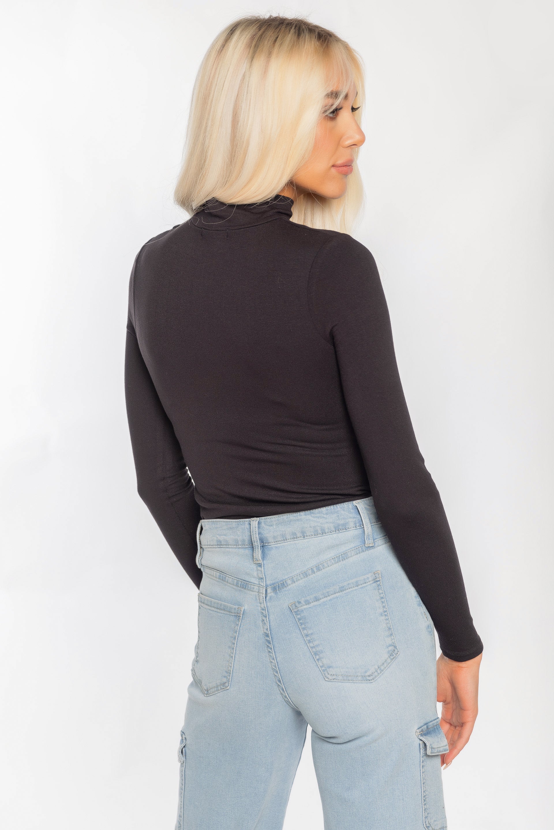 Justaucorp tricot col roulé