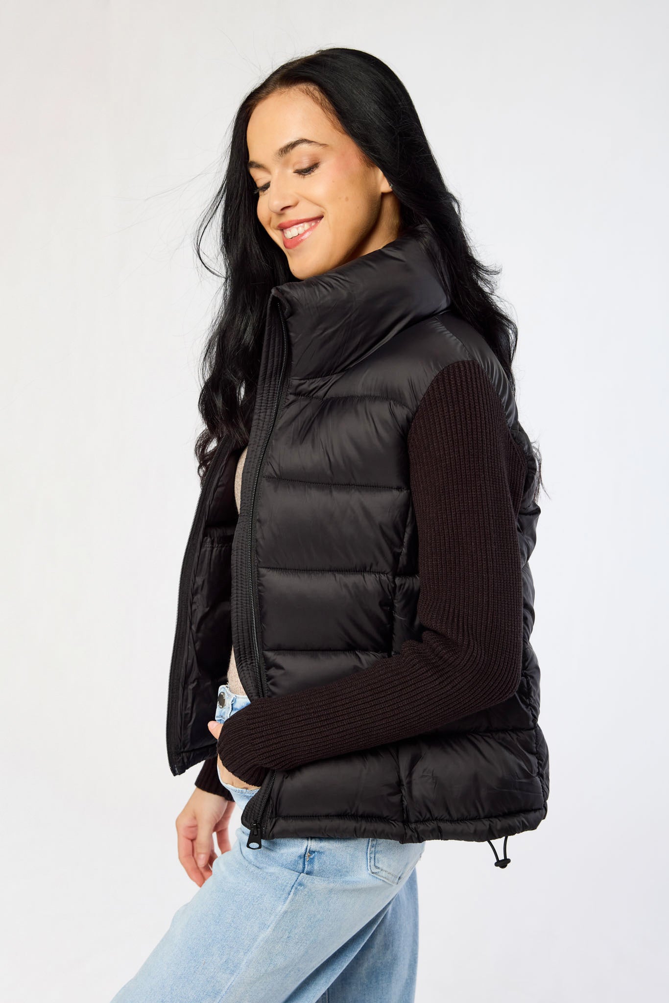 Manteau matelassé à manches tricotées