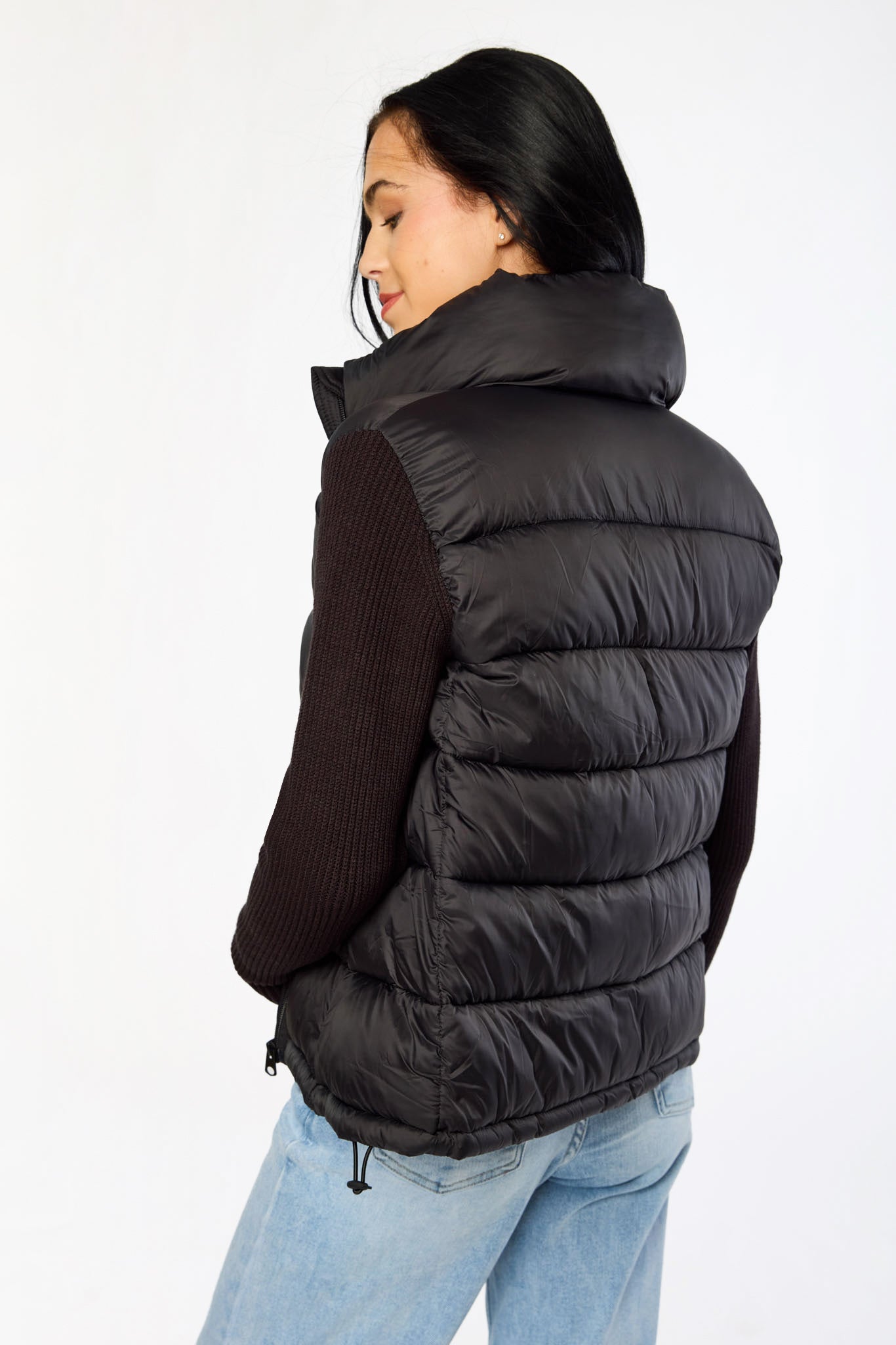 Manteau matelassé à manches tricotées