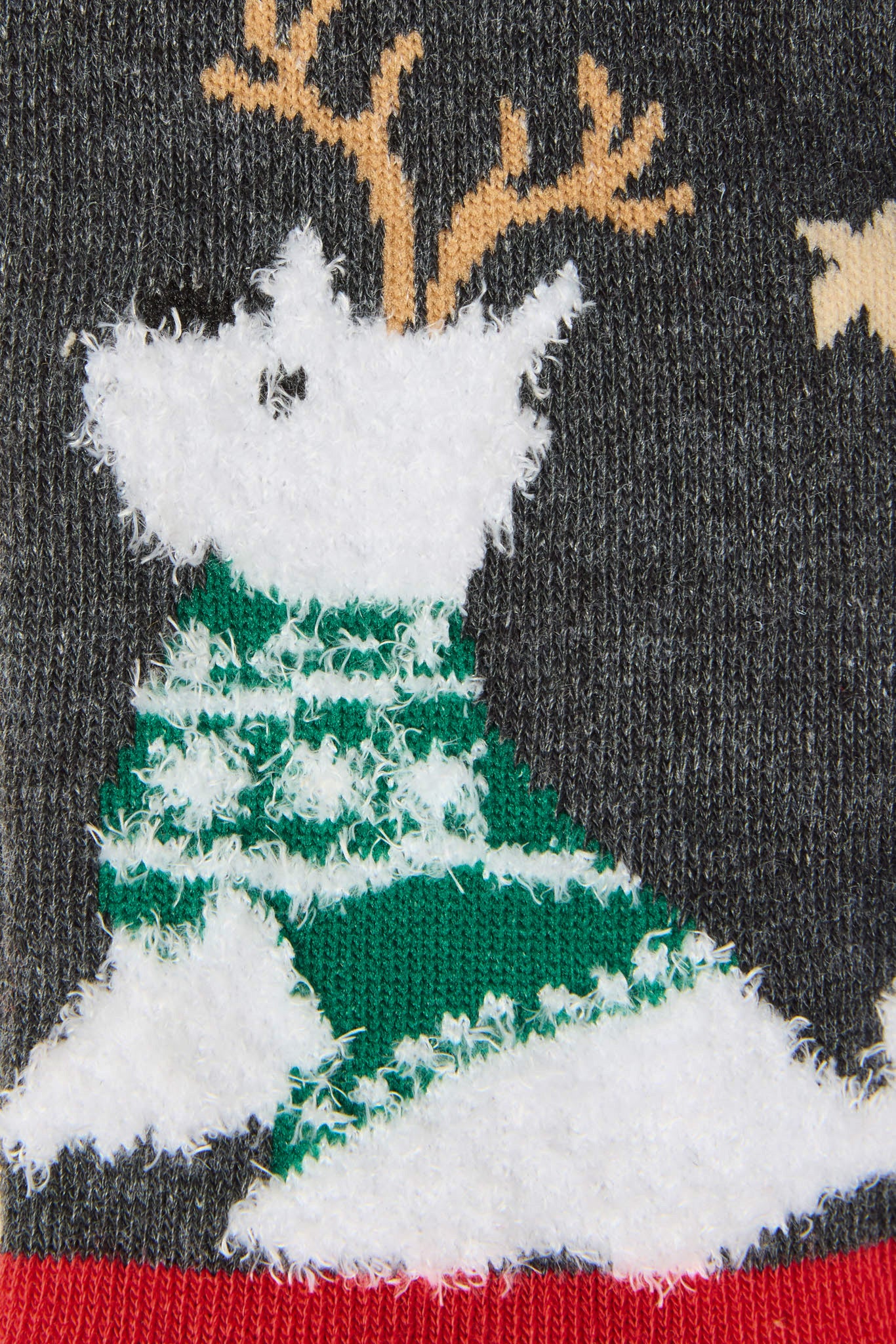 Chaussettes duveteuses des fêtes avec chiens écossais et étoiles