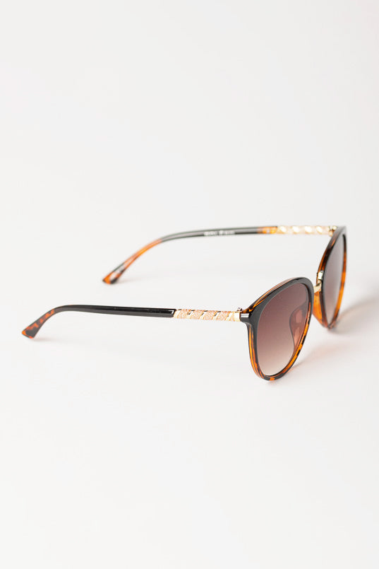 Lunettes de soleil pantos bicolores avec bordure en métal pailleté