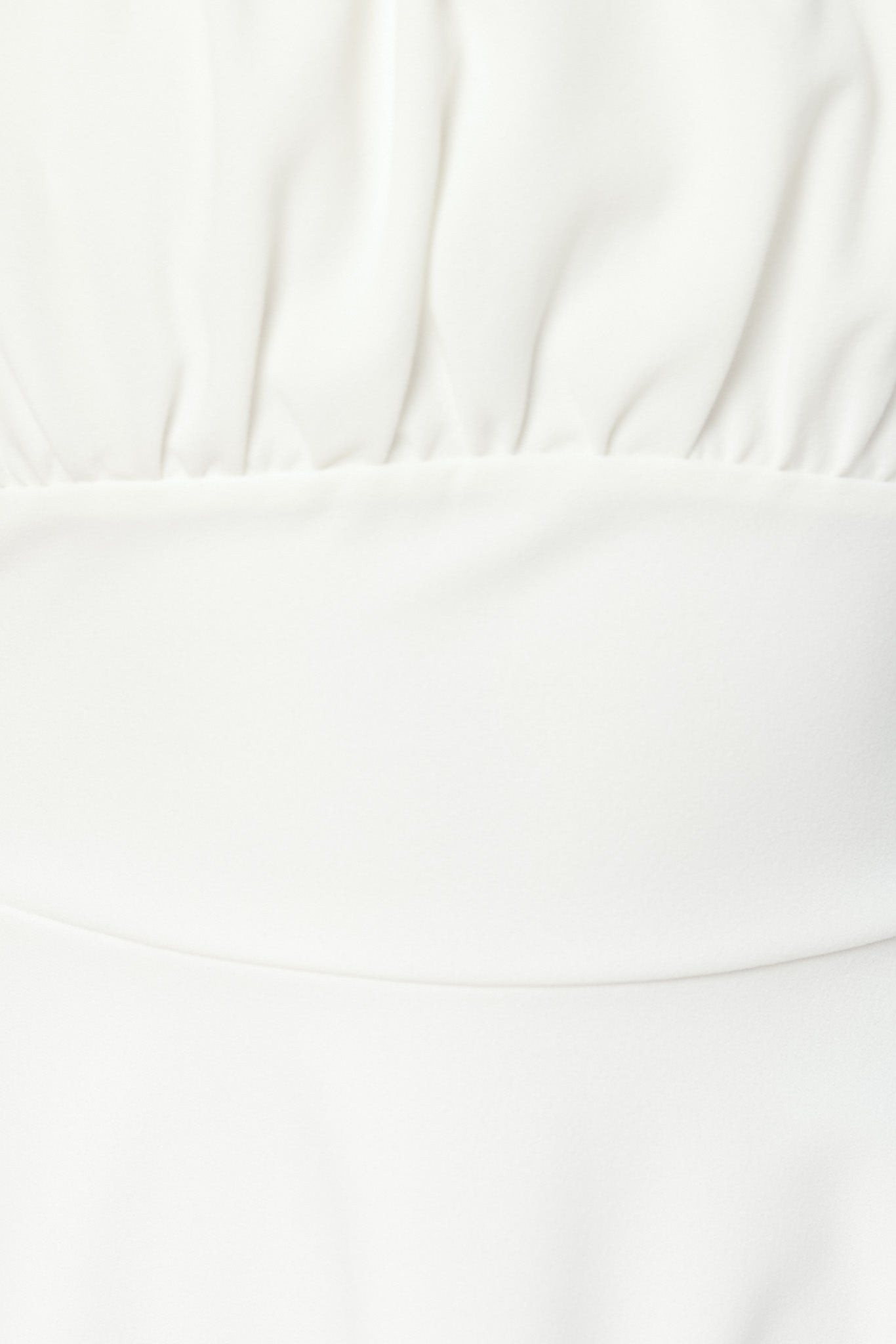 Robe patineuse à bretelles spaghetti en crêpe extensible