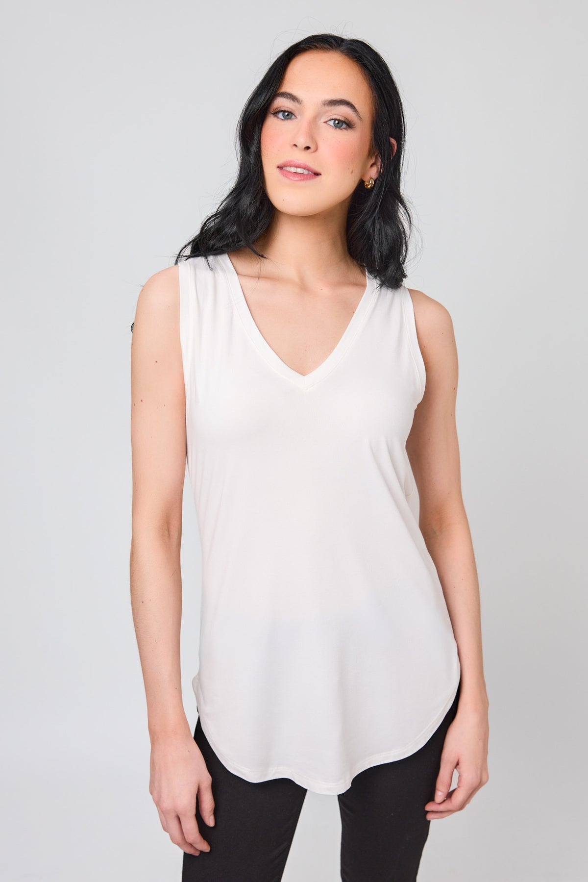 Sleeveless V-Neck Top with Shirttail Hem