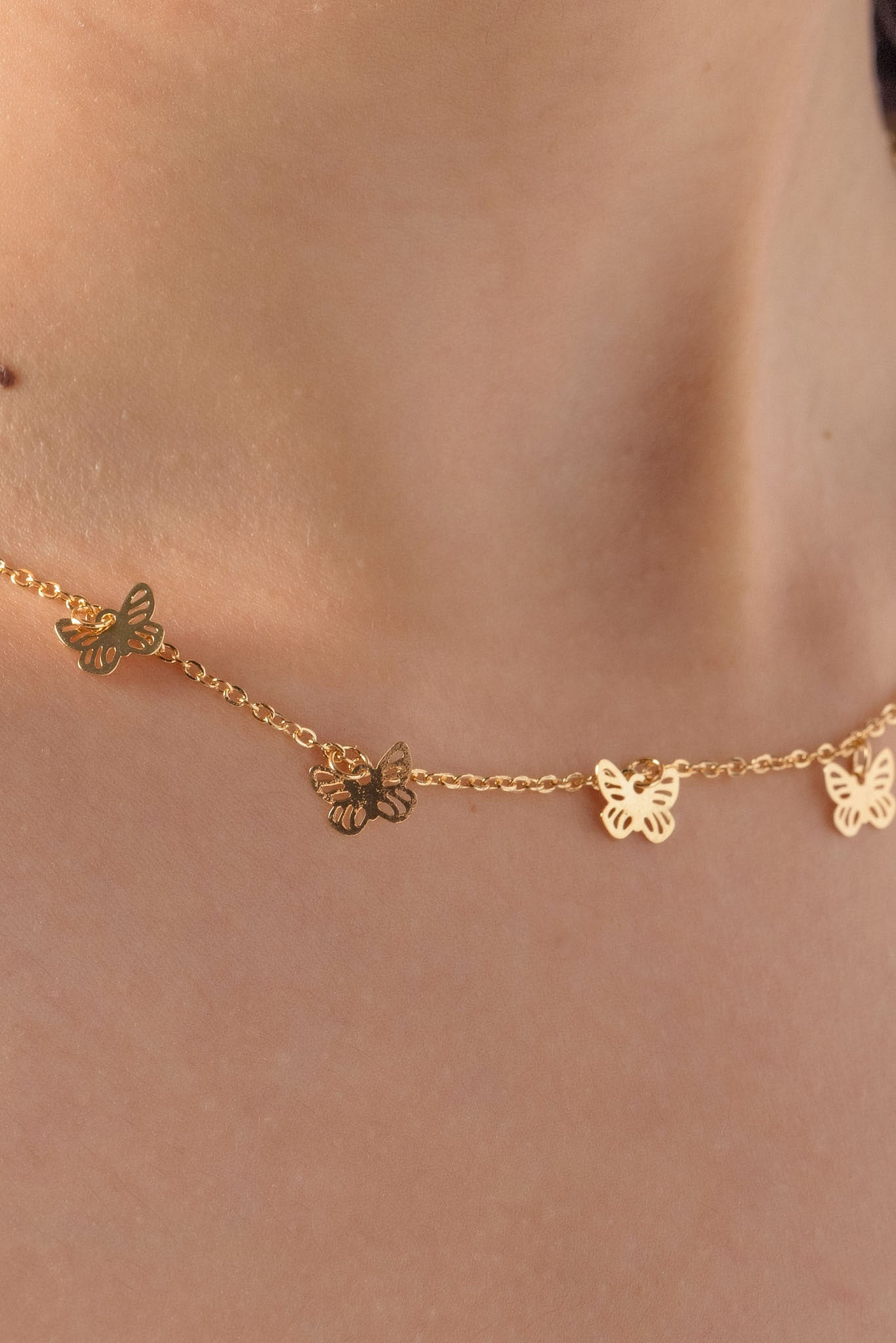 Collier multi-papillons