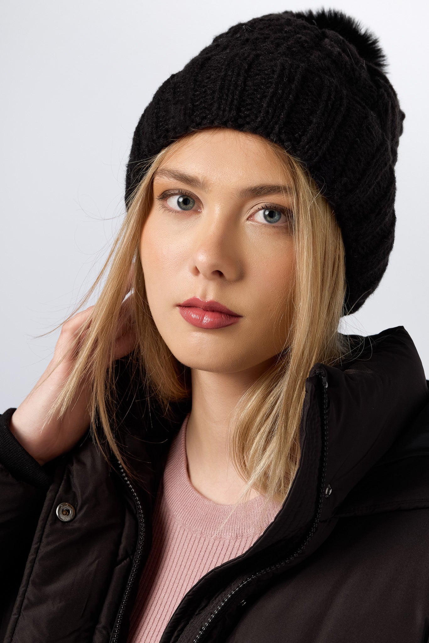 Tuque en tricot avec pompon et doublure en fausse fourrure